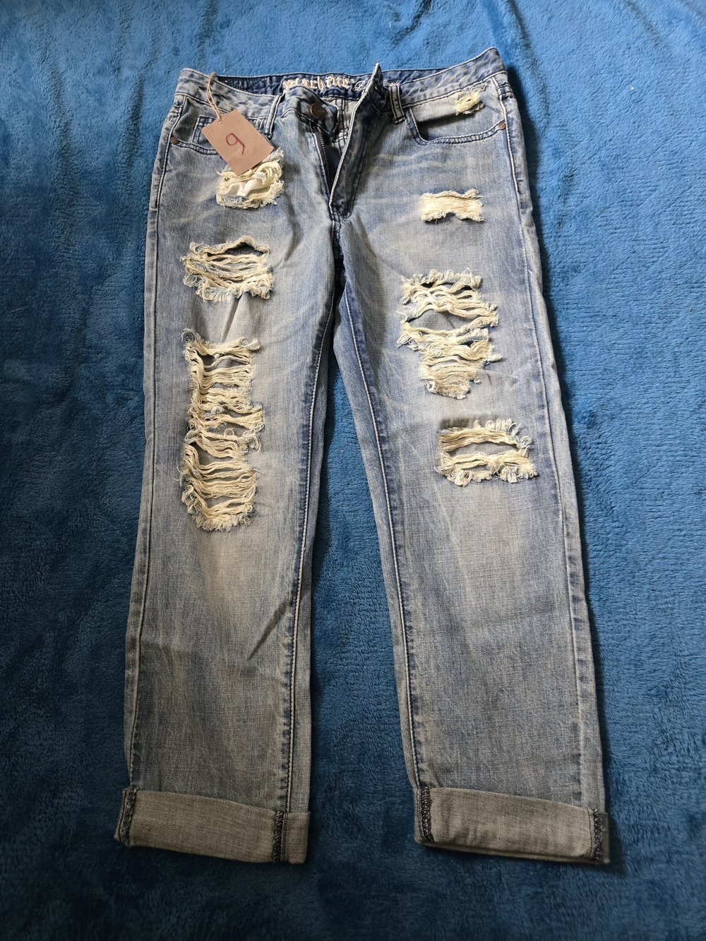 Women’s Distressed Light Blue Denim Jeans